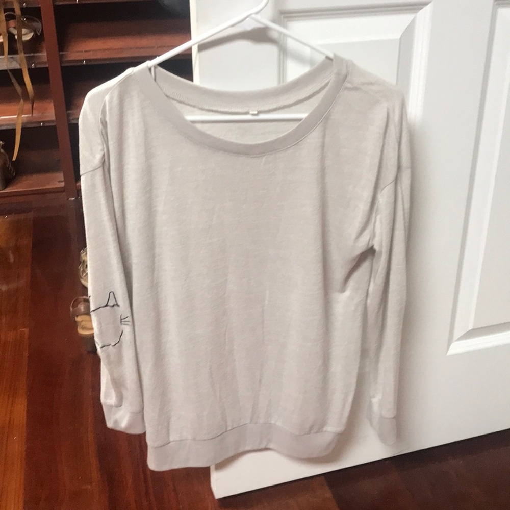 Top with cat print on elbows